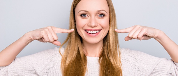 patient smiling after getting cosmetic dentistry in Jacksonville