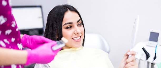 patient smiling during checkup