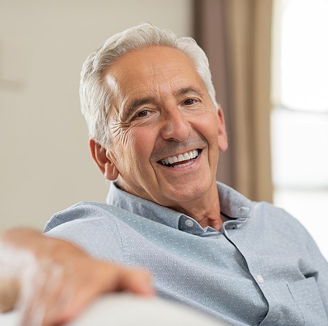 Man smiling after root canal thearpy