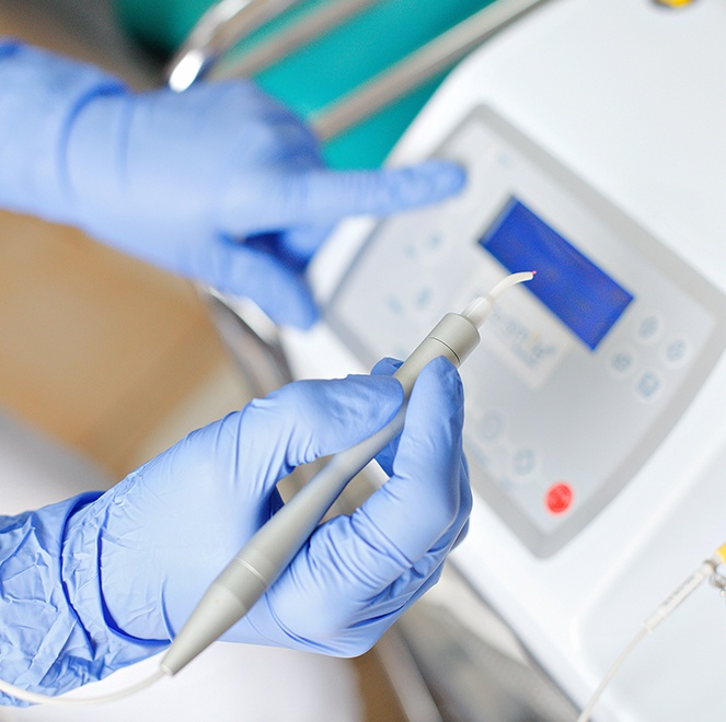 Patient receiving laser dentistry treatment