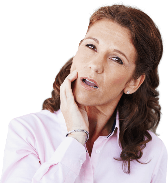 Woman in need of TMJ therapy holding cheek