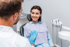 happy woman smiling at dentist 