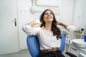 Woman showing being sedated at the dentist's office feels like relaxation