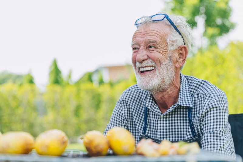 mature man eating with dentures in Jacksonville