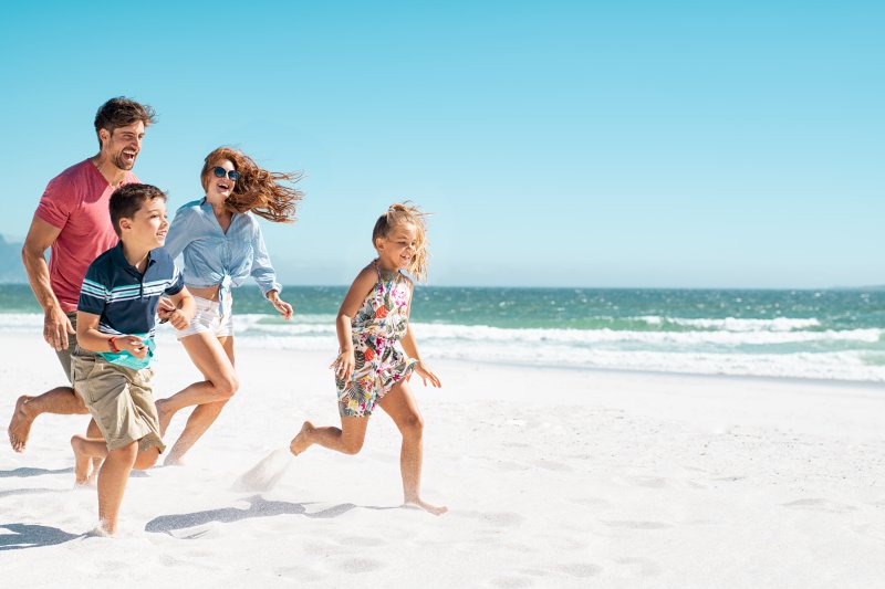 smiling family at the beach