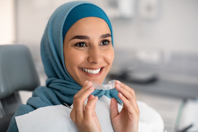 Woman about to try Invisalign