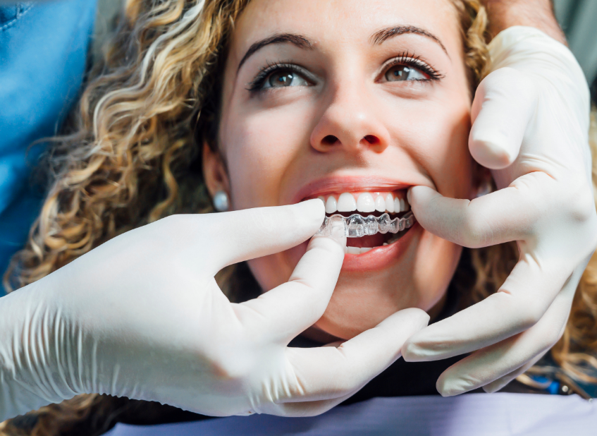 Woman getting Invisalign treatment